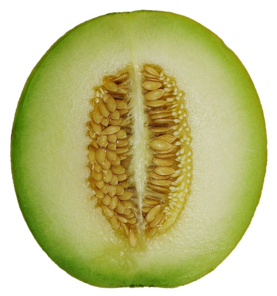 Fruits 桌布 壁紙 — 一個完美切半的蜜瓜，在純白背景下展現其淡綠色果肉和密集的種子簇。