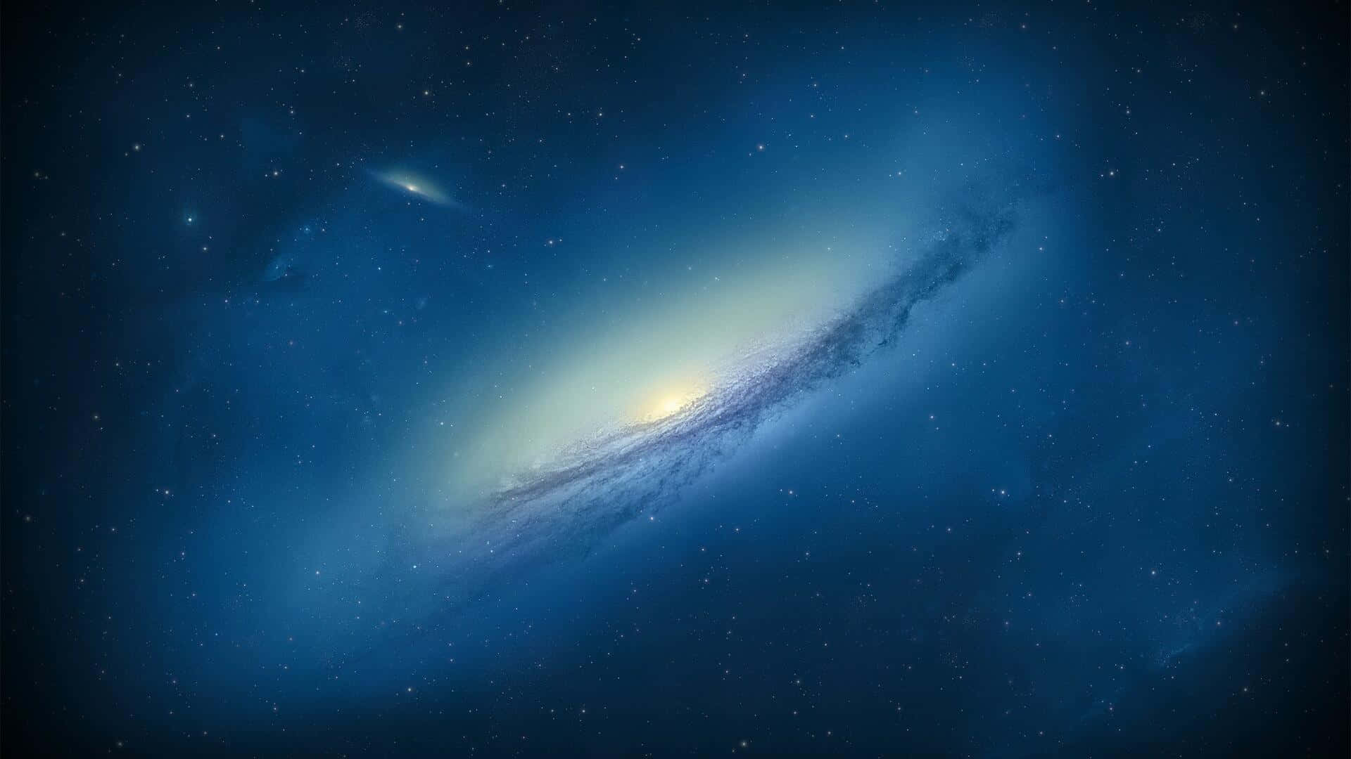 桌布 壁紙 — 一個宏偉的螺旋星系，核心明亮，藍色旋臂在星空中閃耀。