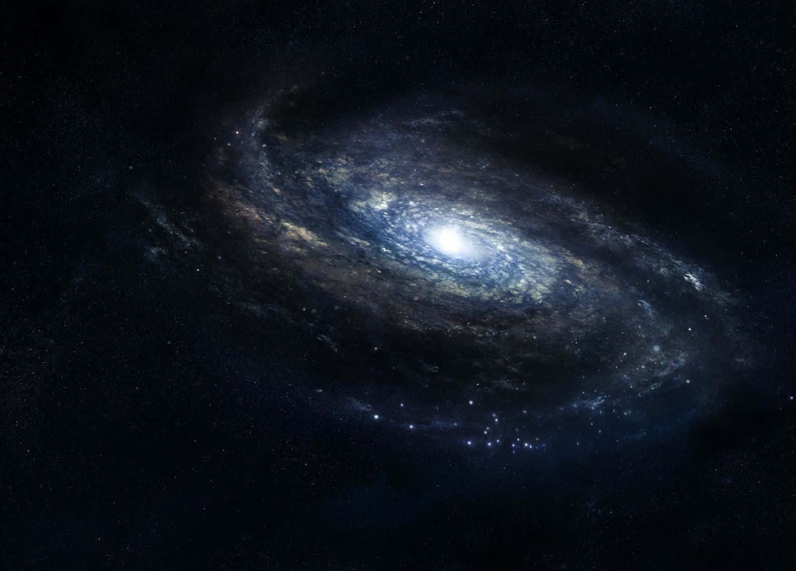 酷炫太空 桌布 壁紙 — 一個宏偉的螺旋星系在繁星點點的宇宙虛空中閃耀著藍色和金色的色調。