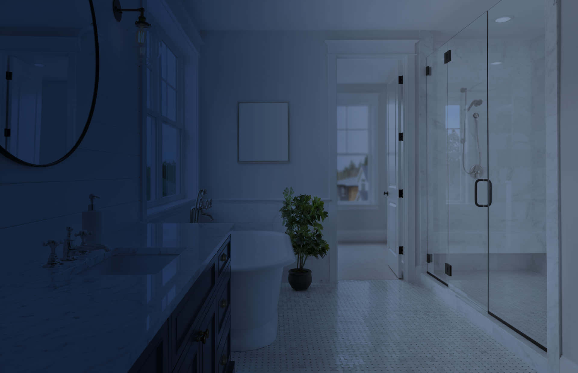 Bathroom Decor 桌布 壁紙 — 一個寧靜的現代浴室，沐浴在清涼的藍光中，配有獨立式浴缸、玻璃淋浴間和大理石檯面。