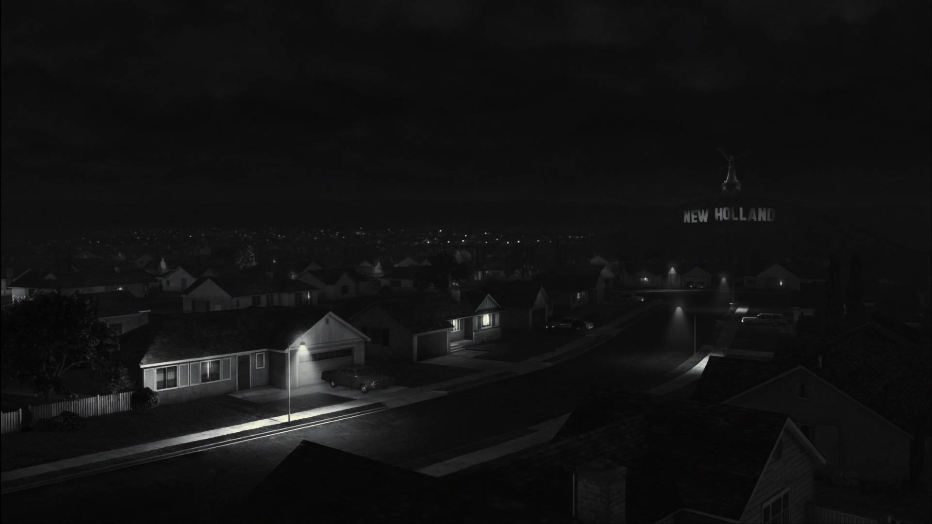 Frankenweenie 桌布 壁紙 — 一個寧靜郊區住宅區的黑白夜景，散落著房屋燈光和遠處的「NEW HOLLAND」標誌。
