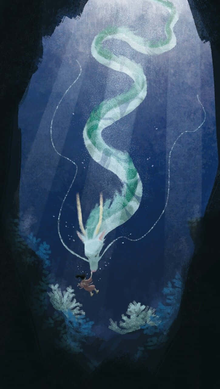 Haku Spirited Away Phone 桌布 壁紙 — 一個小潛水員在深藍色水下洞穴中遇到一條雄偉的發光綠色蛇形生物。