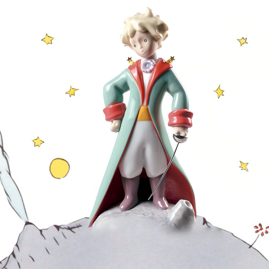Stars 桌布 壁紙 — 一個小王子的瓷器公仔站在岩石突出物上，手持一把劍，周圍有星星和一個黃色星球漂浮。