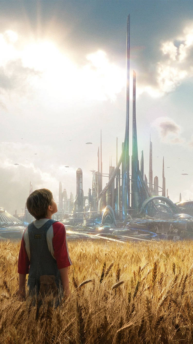 Tomorrowland Movie 桌布 壁紙 — 一個小男孩站在金色的麥田裡，凝視著烈日下高聳的未來城市。