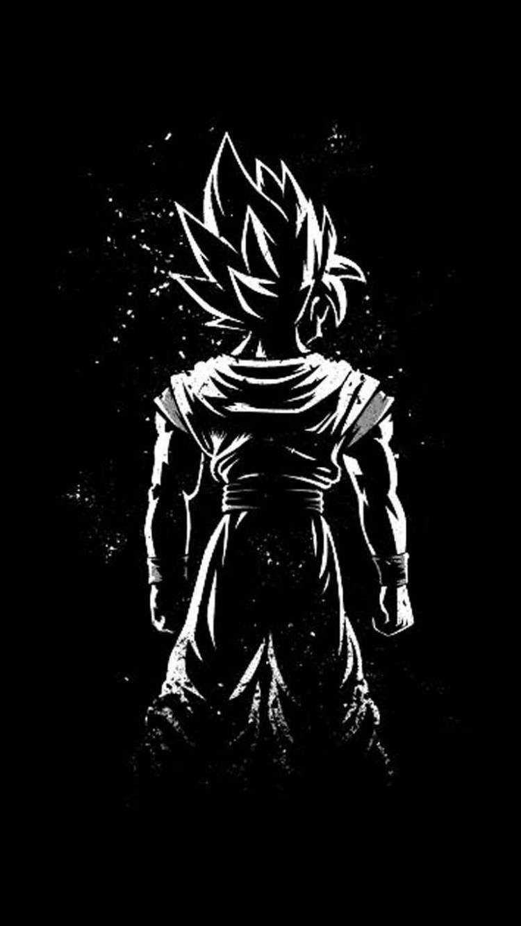 Silhouette 桌布 壁紙 — 一個尖刺頭髮的動漫戰士從背後觀看的鮮明白色剪影，背景為黑色並帶有散落的斑點。