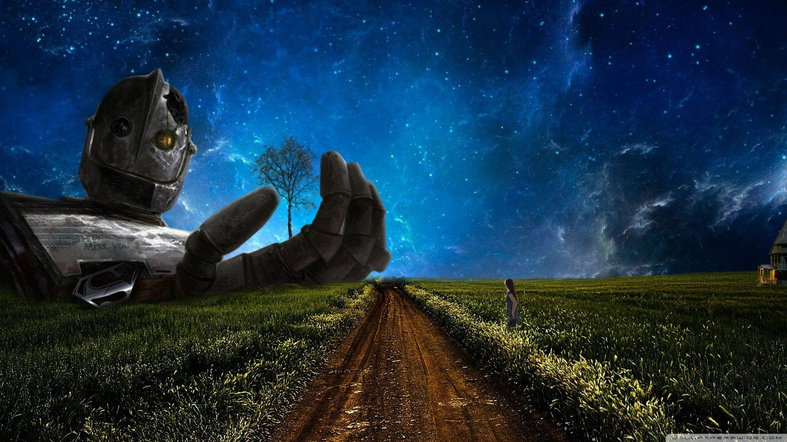 Giants 桌布 壁紙 — 一個巨型機器人躺在草地上，夜空繁星點點，一個細小身影沿著泥路向它伸出的手走去。