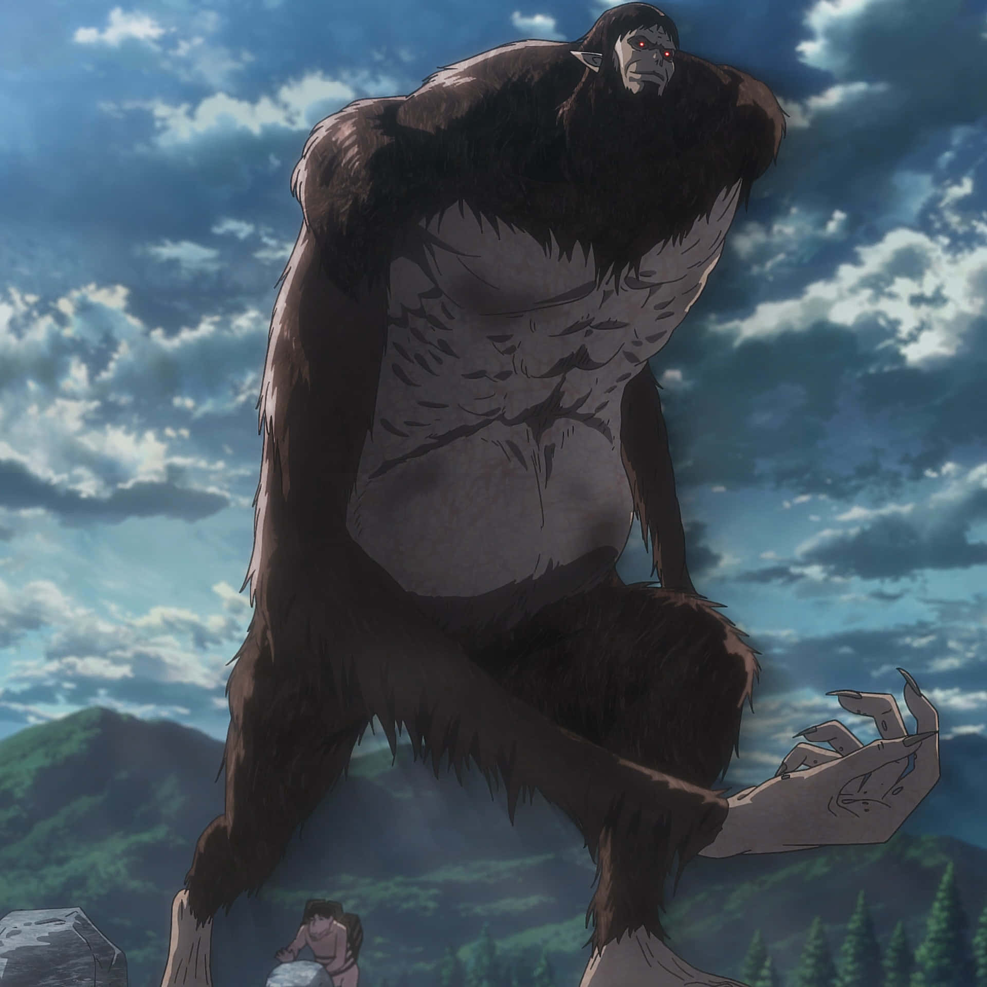 Humanoid Monsters 桌布 壁紙 — 一個巨大、肌肉發達、深色毛髮的泰坦，閃爍著紅光的眼睛，在陰天和森林覆蓋的山丘背景下，籠罩著一個微小的人類身影。