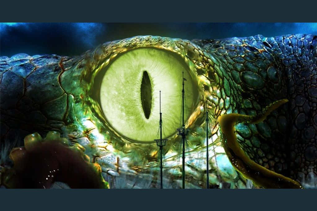 Underwater Scary Ocean 桌布 壁紙 — 一個巨大生物的發光綠色眼睛佔據了畫面，透過其瞳孔可以看到船桅。