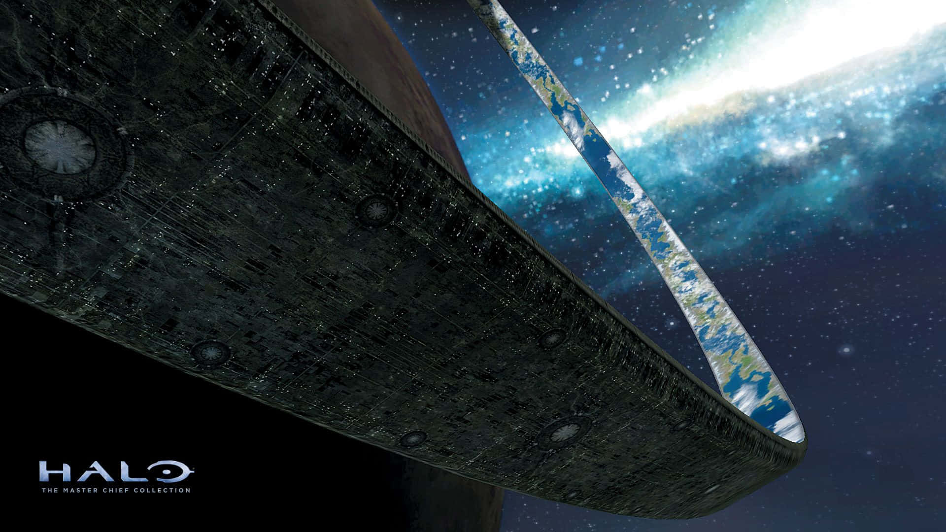 Halo Ring 桌布 壁紙 — 一個巨大的Halo環漂浮在太空中，地球透過其核心在繁星點點的宇宙背景下可見。