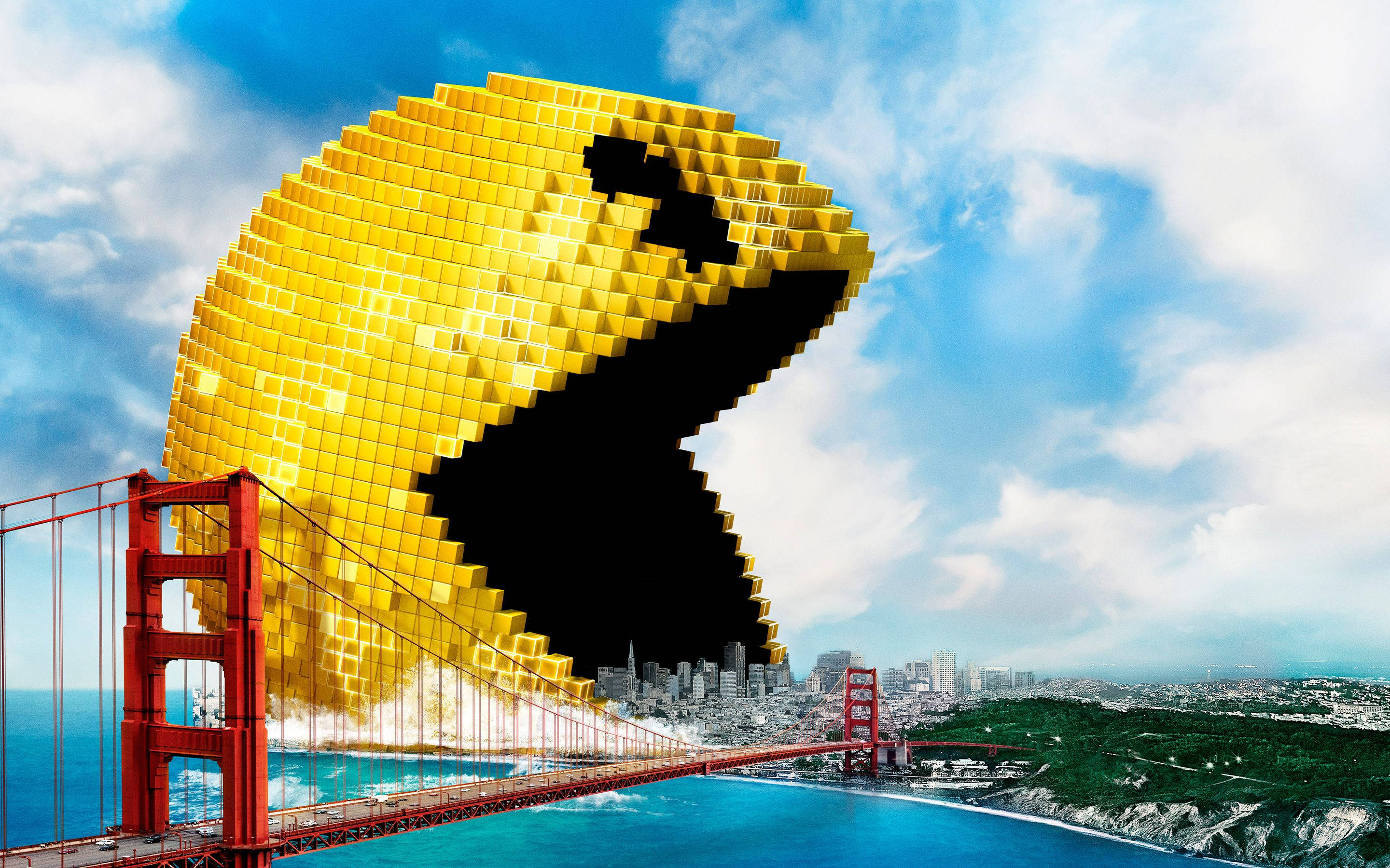 Pixel 桌布 壁紙 — 一個巨大的像素化Pacman籠罩在金門大橋上，吞噬著明亮的藍天下的城市景觀。