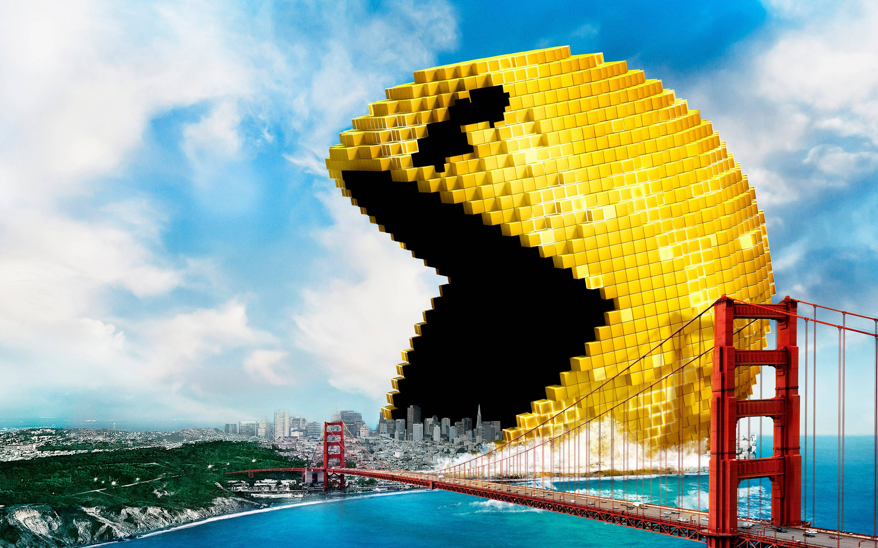 Pacman 桌布 壁紙 — 一個巨大的像素化小精靈張開嘴巴，在藍天下籠罩著金門大橋。
