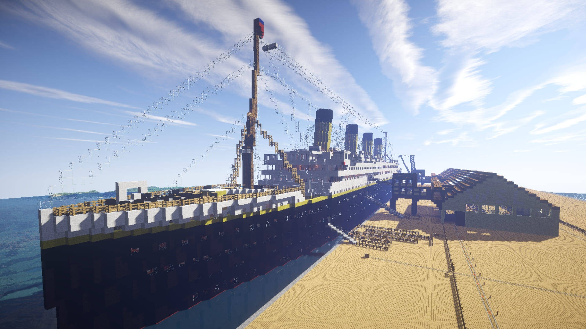 Minecraft Aesthetic 桌布 壁紙 — 一個巨大的像素化鐵達尼號複製品擱在沙灘上，天空湛藍，白雲輕飄。