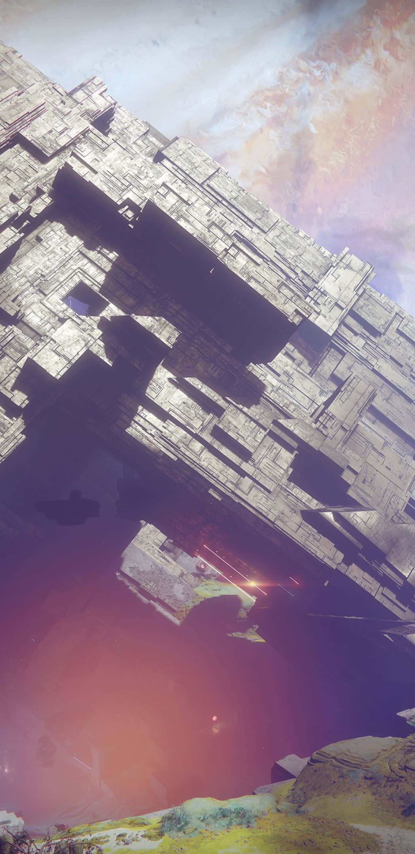 Destiny 2 桌布 壁紙 — 一個巨大的棱角太空站籠罩在一顆發光的外星行星上，周圍環繞著旋轉的粉紅色和橙色雲層。