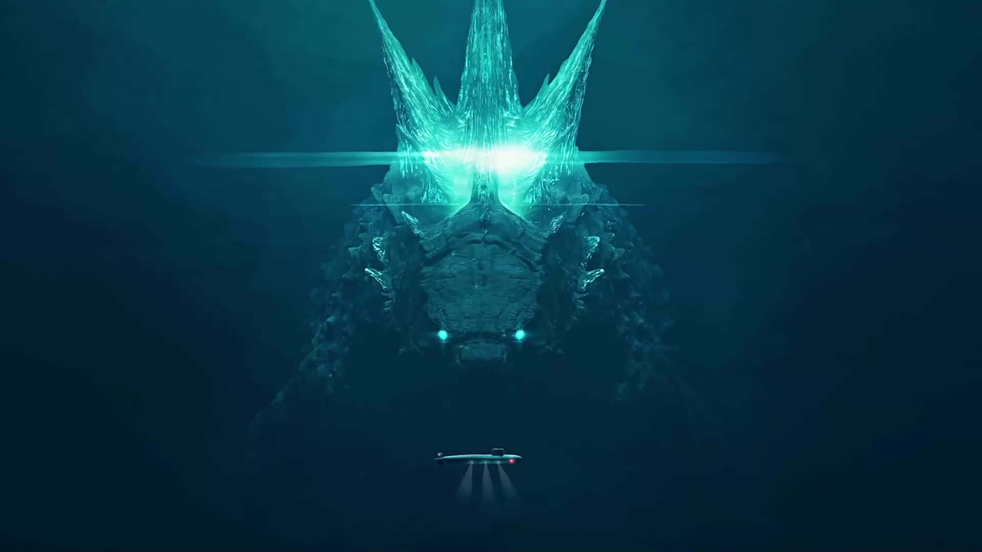 monsters 桌布 壁紙 — 一個巨大的發光外星生物，帶有水晶般的脊刺，潛伏在水下，一艘小型潛艇從下方接近。