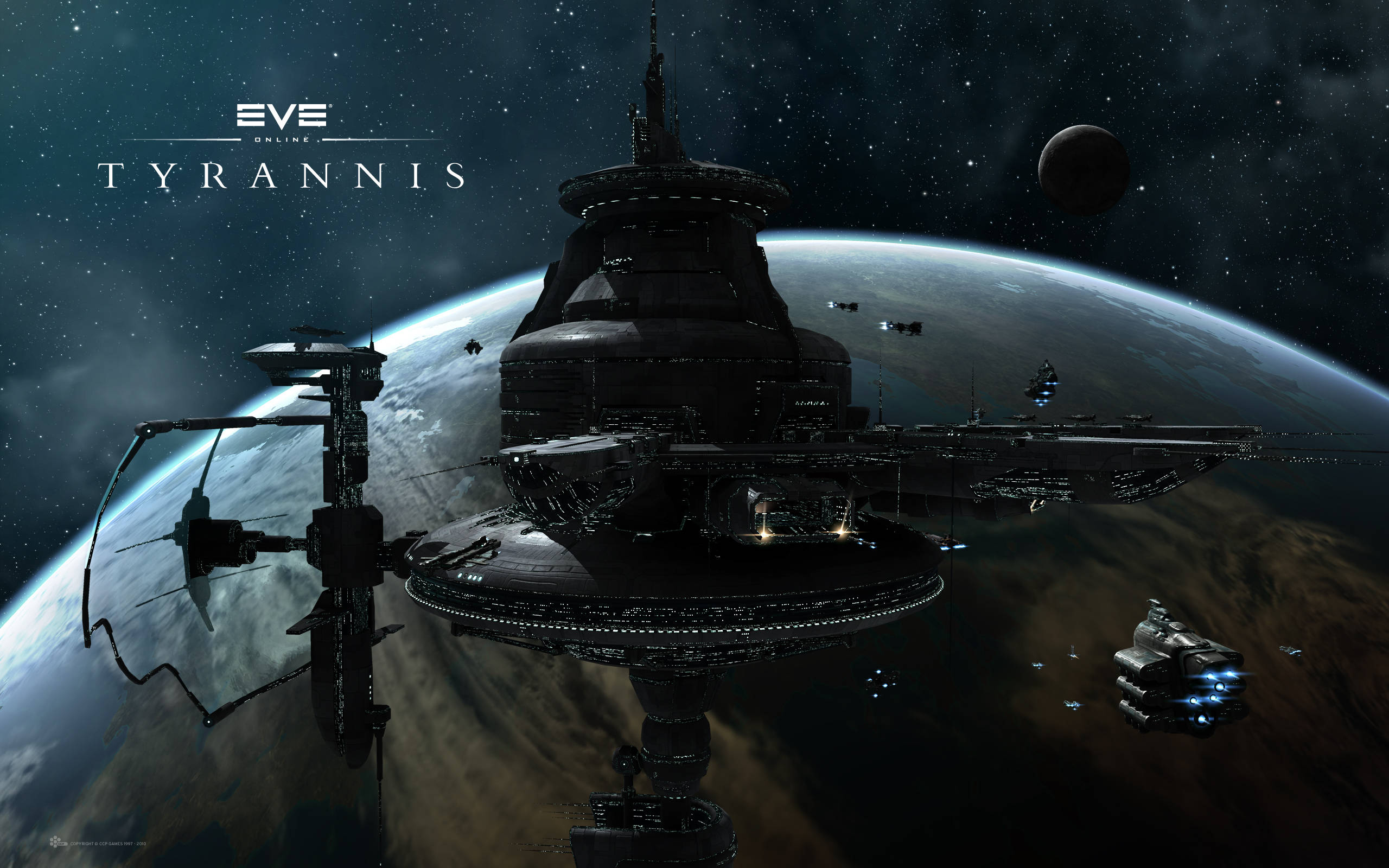 games 桌布 壁紙 — 一個巨大的黑暗太空站圍繞著一顆行星運行，行星上有發光的燈光，背景是繁星點點的夜空。