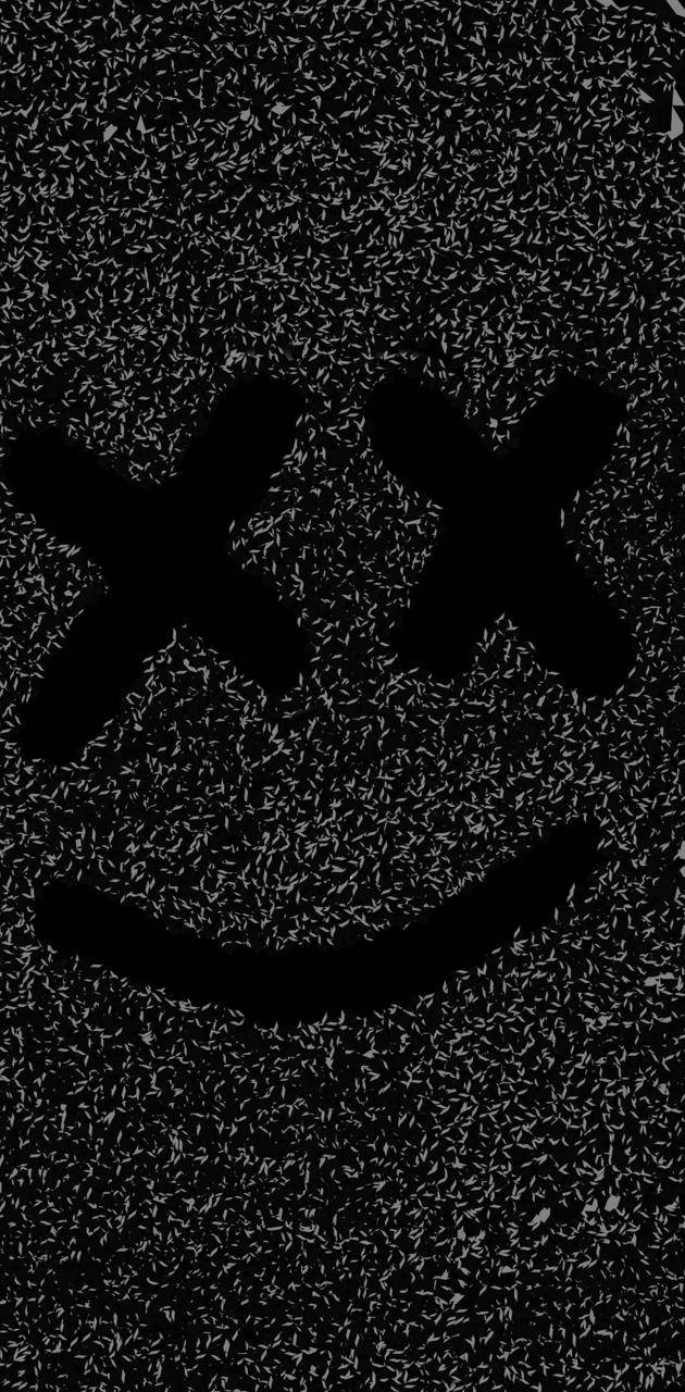 一個在嘈雜靜態背景上帶有 X 眼睛的扭曲笑臉。