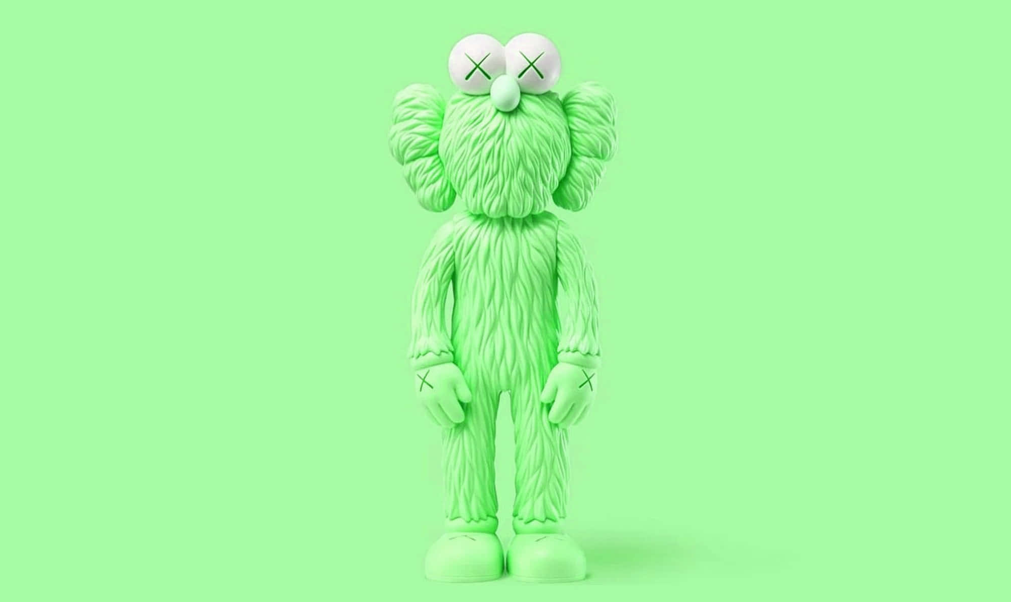 Kaws Figures 桌布 壁紙 — 一個帶有X形眼睛的萊姆綠色KAWS Companion公仔，居中站立在純薄荷綠色背景上。