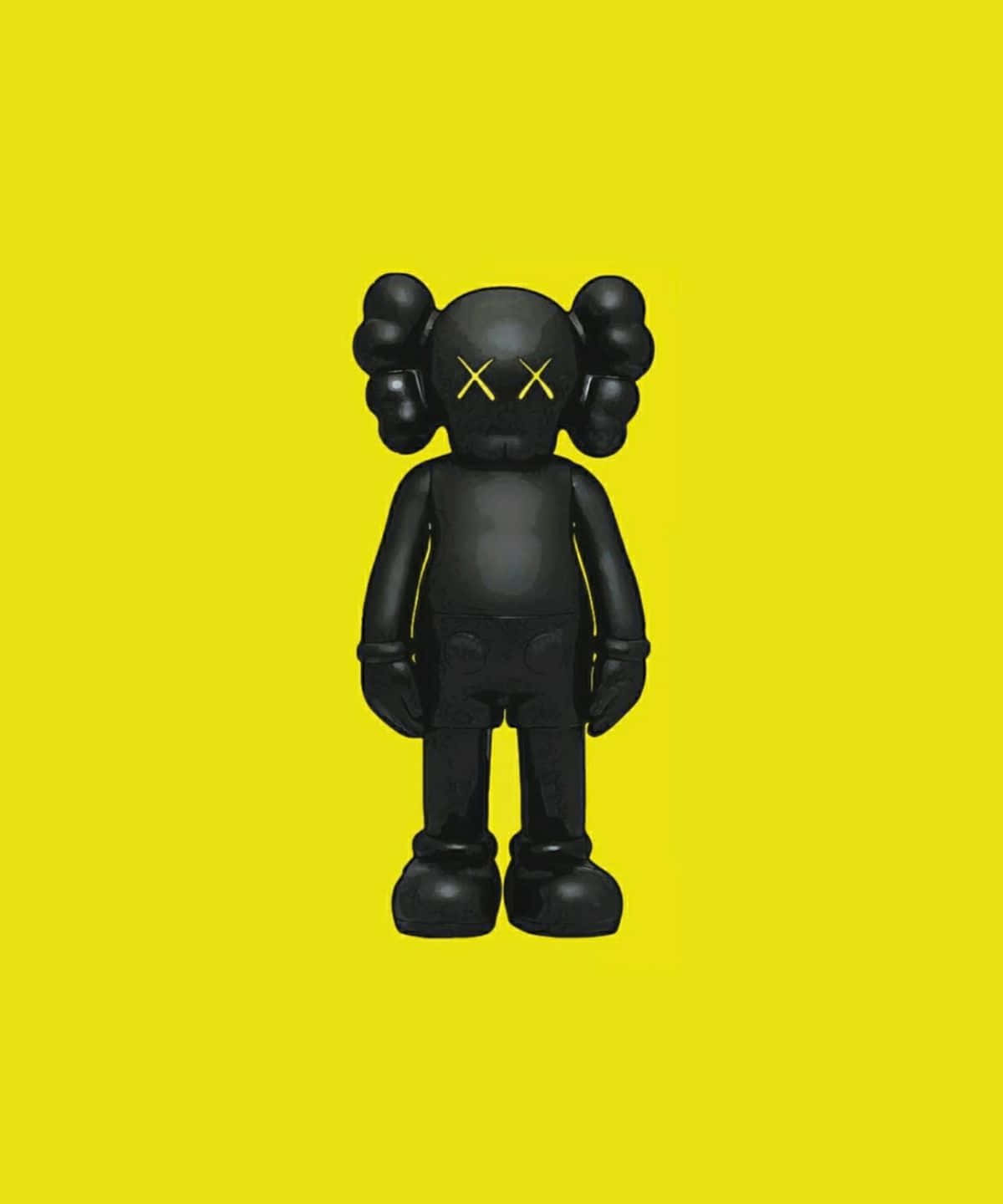 Kaws Figures 桌布 壁紙 — 一個帶有X眼睛的光澤黑色KAWS公仔，在鮮黃色背景中央站立。