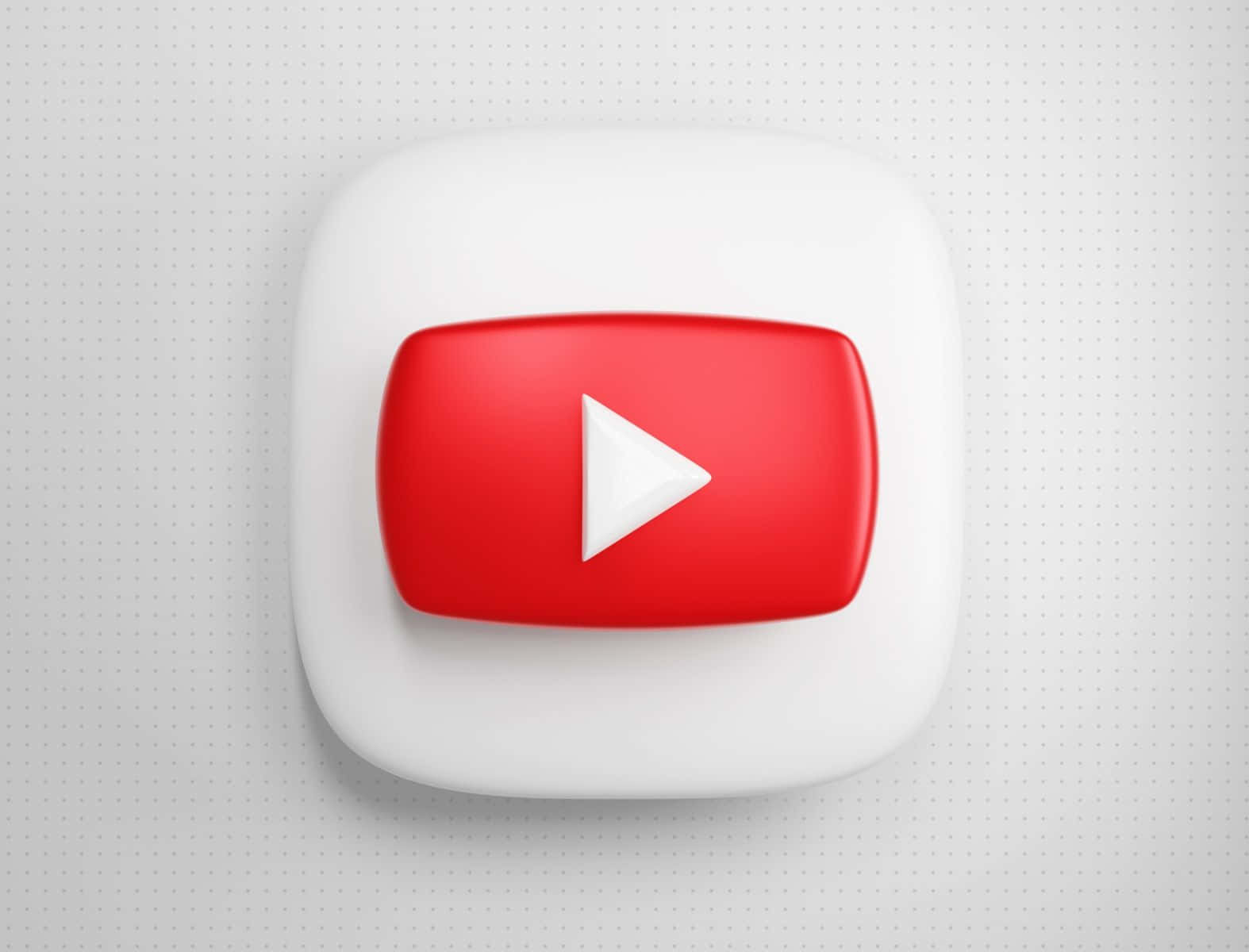 影片 桌布 壁紙 — 一個帶有光澤的3D渲染YouTube播放按鈕圖示，居中放置在淺灰色點狀背景上。