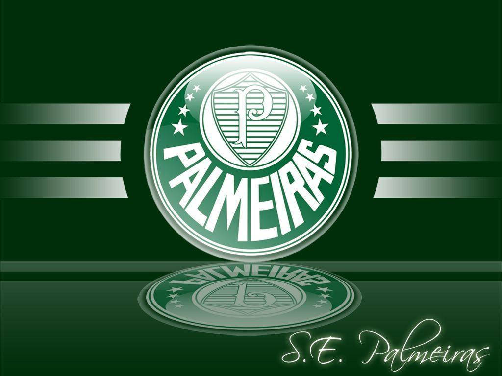 Palmeiras 桌布 壁紙 — 一個帶有光澤的綠色和白色帕爾梅拉斯足球俱樂部標誌，居中在深綠色背景上，帶有反射表面和風格化條紋。