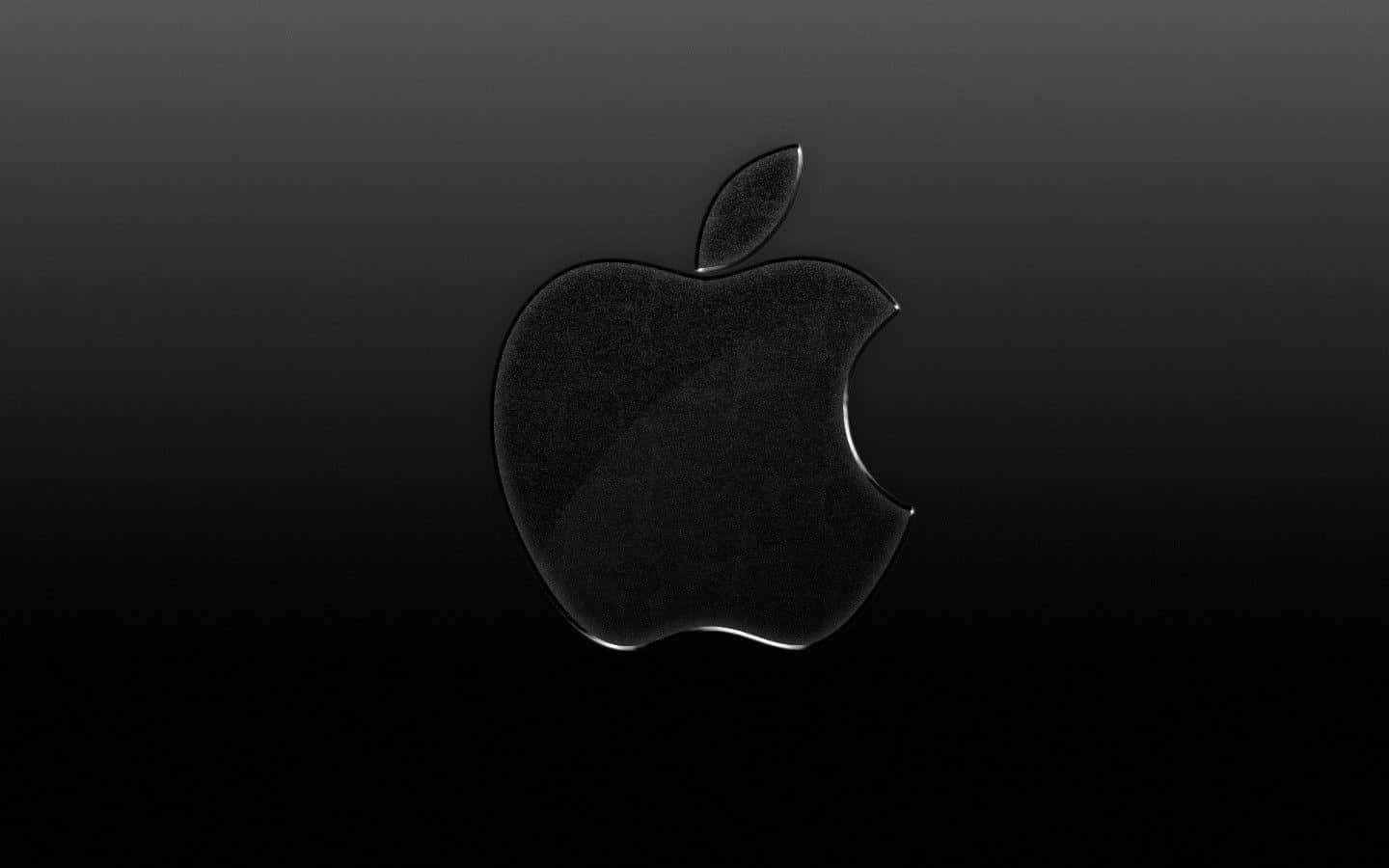 Glossy Black 桌布 壁紙 — 一個帶有咬痕的時尚黑色Apple標誌在漸變深色背景上微妙發光。