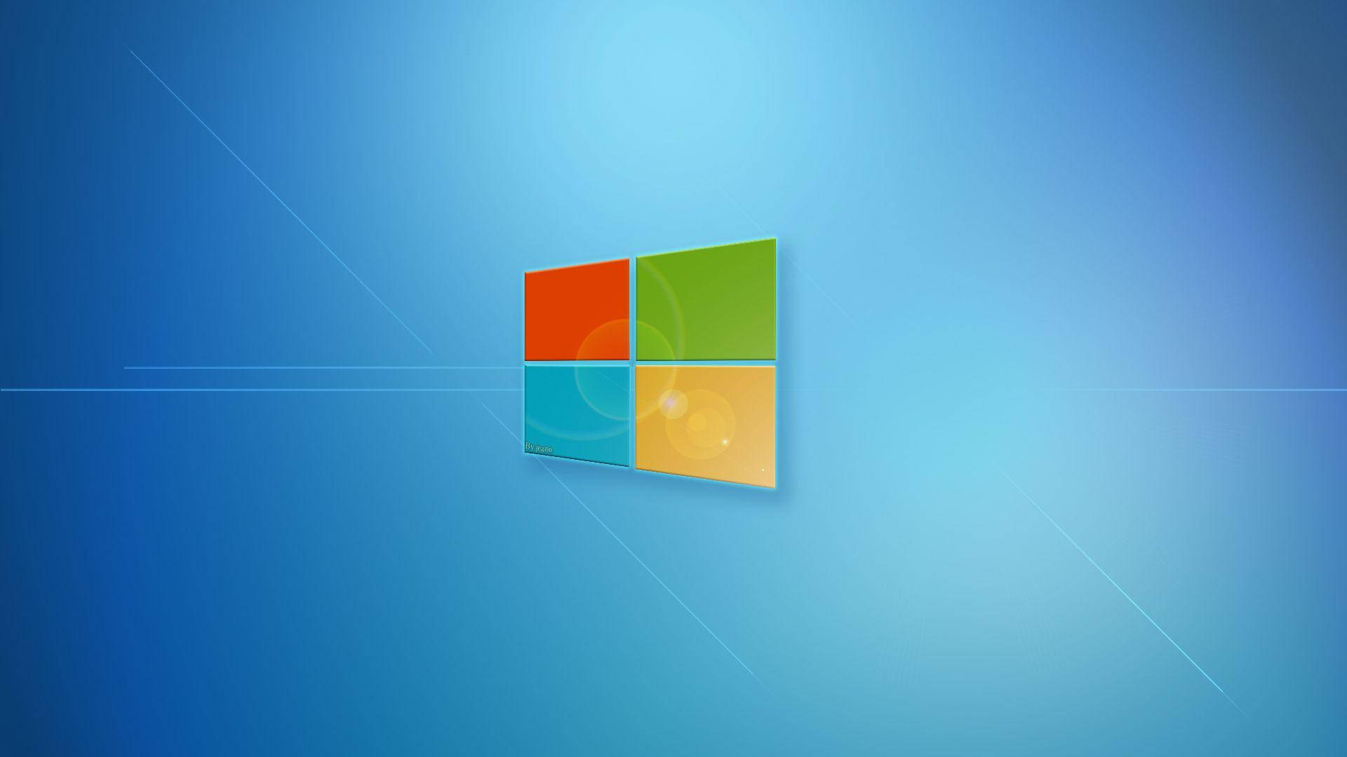 Windows 11 桌布 壁紙 — 一個帶有四個彩色方塊的Windows標誌漂浮在帶有微妙光線條紋的漸變藍色背景上。