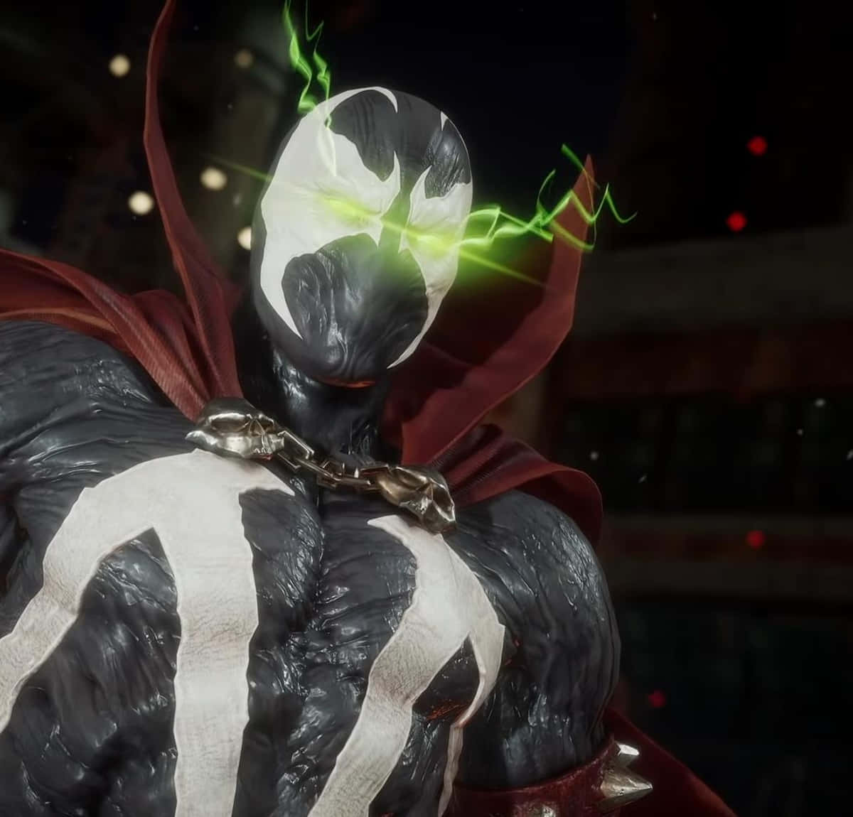 Mortal Kombat 11 Spawn 桌布 壁紙 — 一個帶有威脅性的共生體角色，其白色和黑色面具及紅色斗篷周圍有發光的綠色能量劈啪作響。