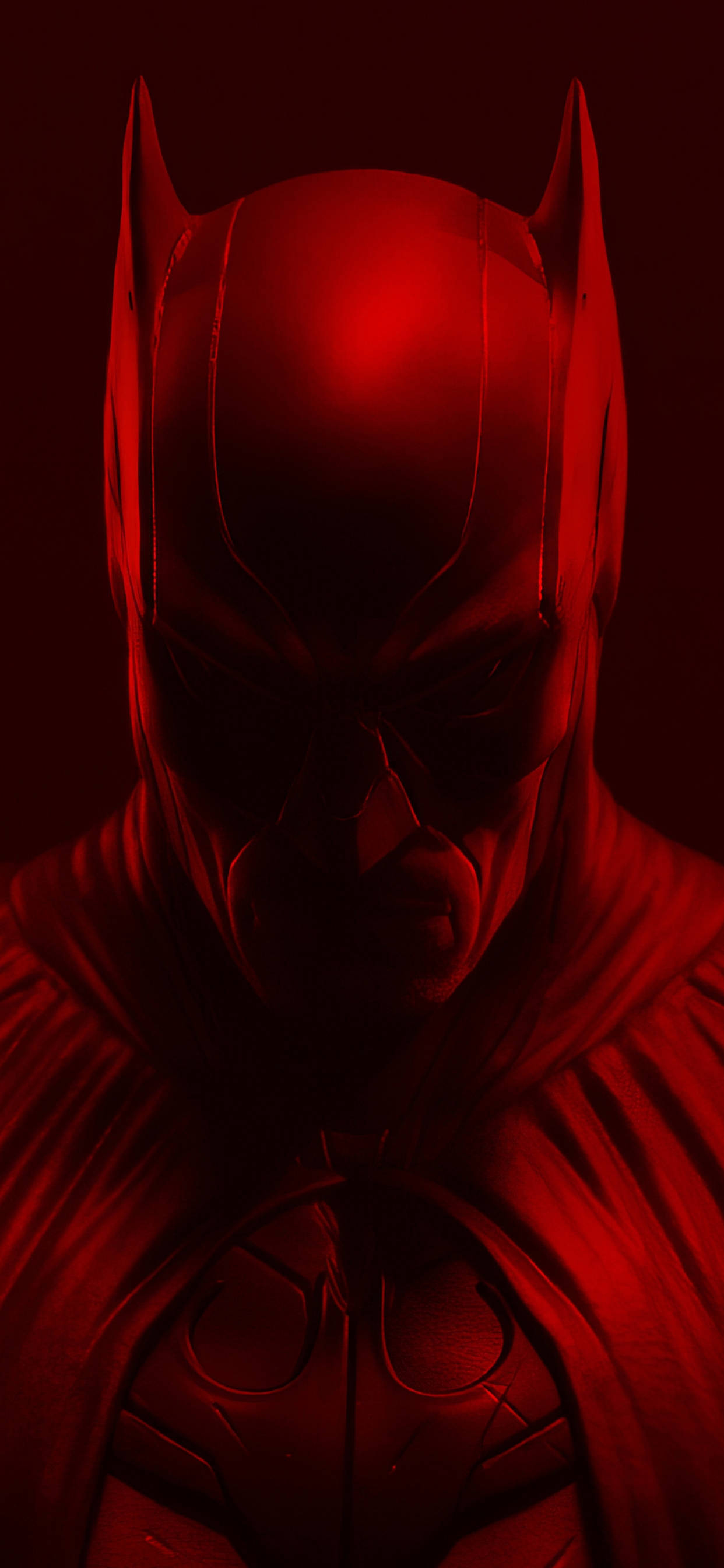 The Batman iPhone 桌布 壁紙 — 一個帶有威脅性的蝙蝠俠在紅色燈光的特寫中，帶有銳利的陰影和強烈的凝視。