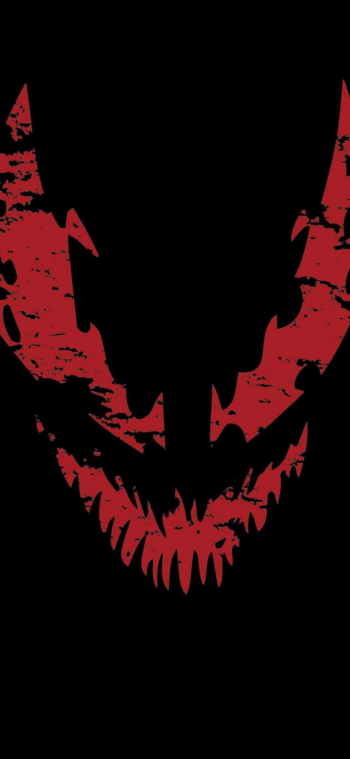 Carnage iPhone 桌布 壁紙 — 一個帶有尖牙和角的紅色惡魔面孔從黑色背景中浮現，令人畏懼。