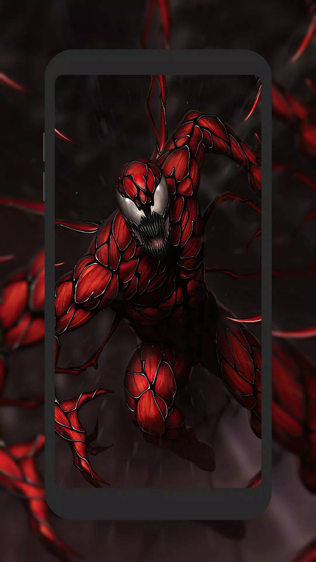 Carnage 桌布 壁紙 — 一個帶有尖牙和黑色血管的威脅性紅色共生生物從智慧型手機螢幕中爆發出來，背景為深色。