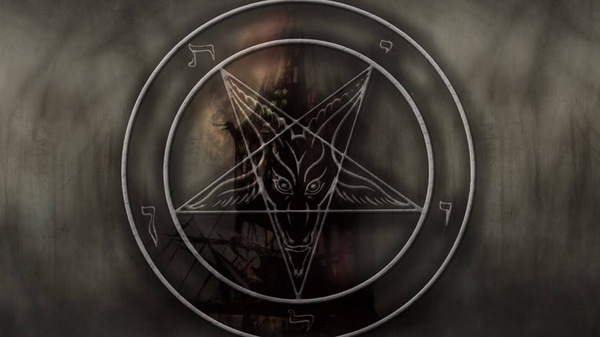 惡魔 桌布 壁紙 — 一個帶有山羊頭的威脅性身影從刻在骯髒混凝土牆上的發光五角星中凝視著。