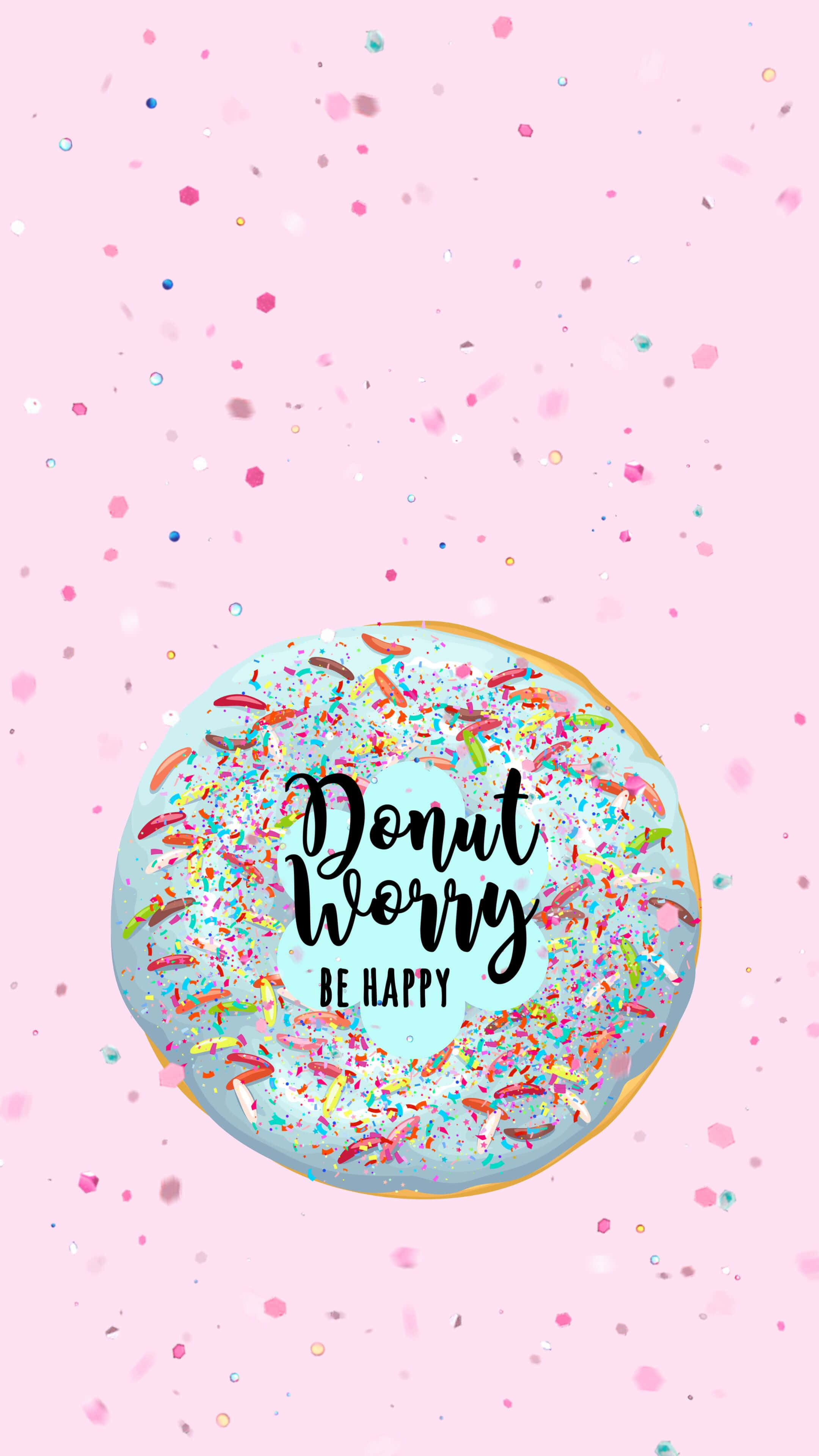 Happy iPhone 桌布 壁紙 — 一個帶有彩虹糖粒的開心甜甜圈，上面寫著「Donut Worry Be Happy」，在柔和的粉紅色背景上漂浮在五彩紙屑中。