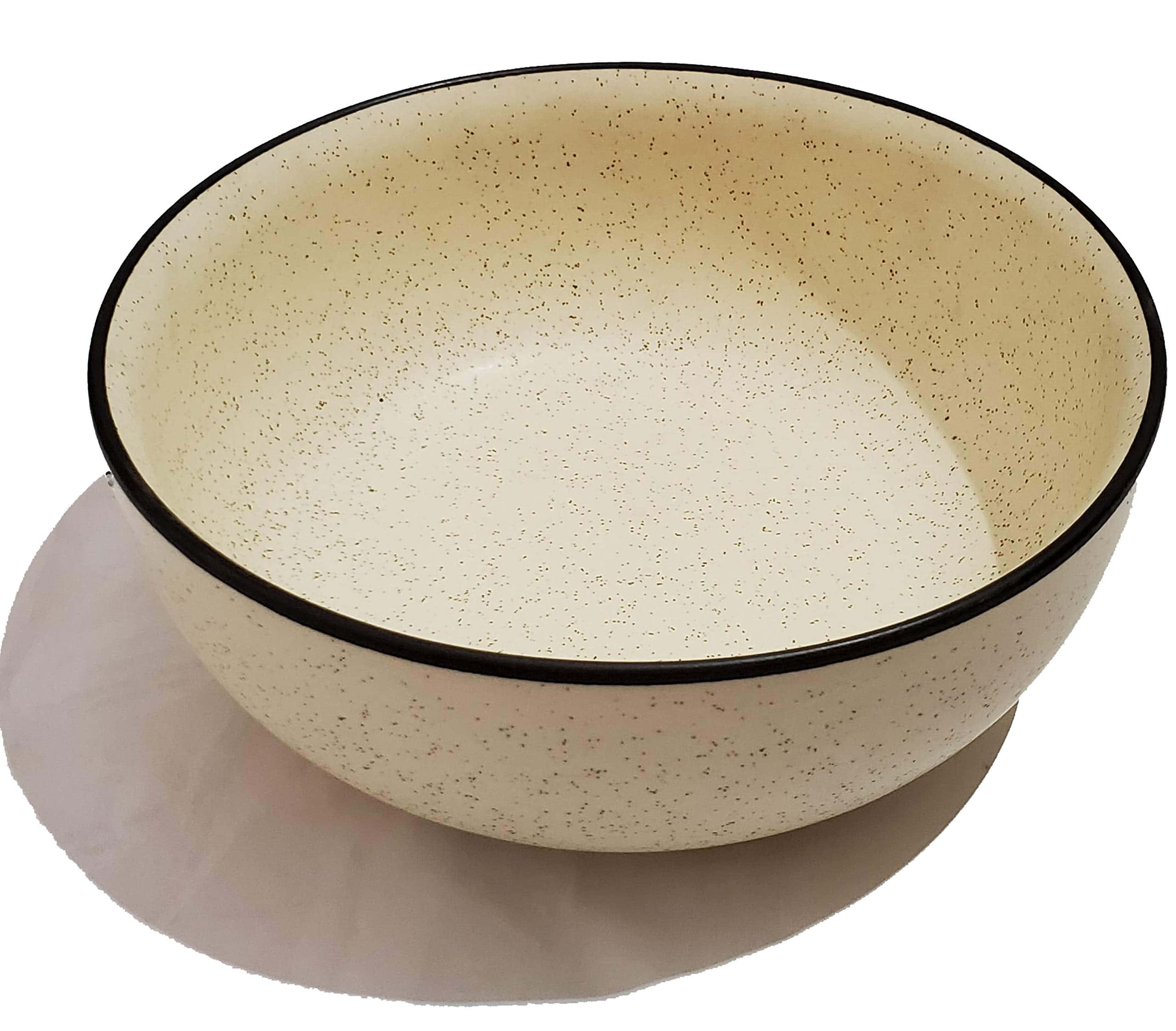 Ceramic 桌布 壁紙 — 一個帶有斑點的奶油色琺瑯碗，配有醒目的黑色邊緣，置於柔和的陰影表面上。