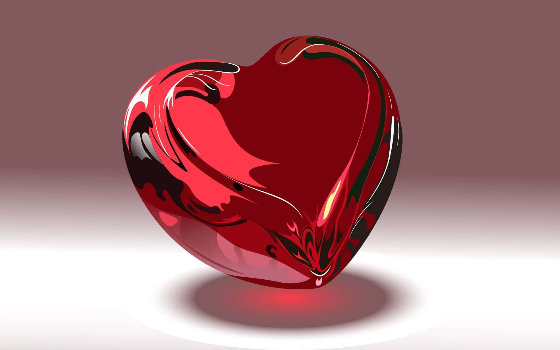 Red Heart 桌布 壁紙 — 一個帶有旋轉黑色圖案的亮面紅色心形物體漂浮在柔和的紫紅色背景上。