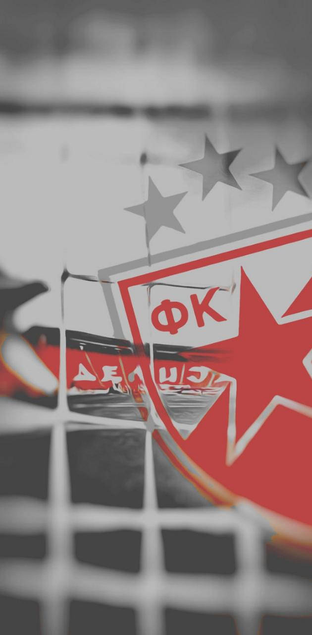 Red Star 桌布 壁紙 — 一個帶有星星和西里爾文字的紅白風格化足球俱樂部徽章反射在破碎的玻璃表面上。