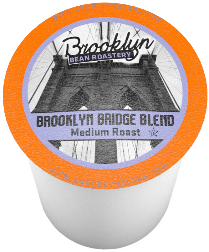 Brooklyn 桌布 壁紙 — 一個帶有橙色邊緣的咖啡膠囊，上面有布魯克林大橋的黑白照片和文字 Brooklyn Bean Roastery Brooklyn Bridge Blend Medium Roast。