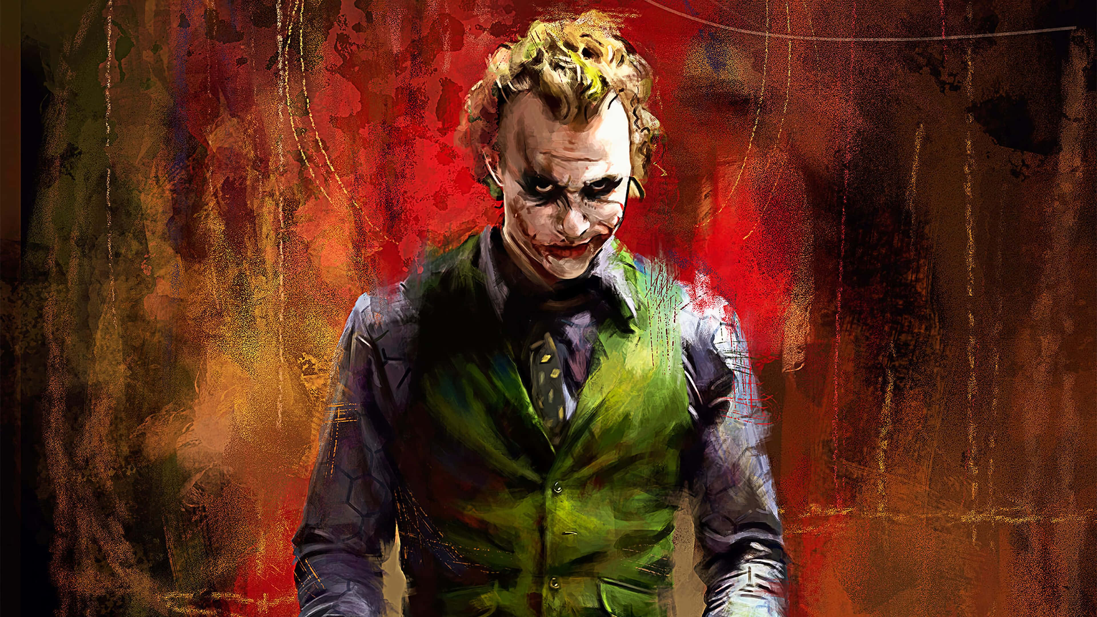 Joker Painting 桌布 壁紙 — 一個帶有狂野頭髮和綠色背心的威脅性小丑，站在混亂的紅色和棕色塗鴉背景前。