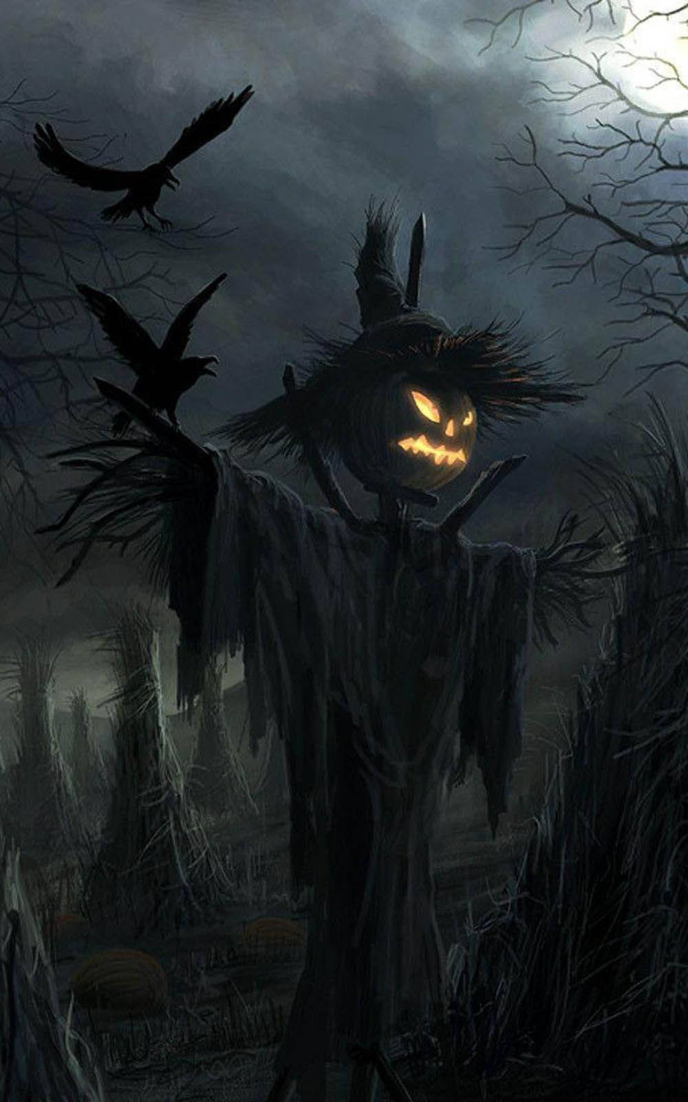 Scary Halloween iPhone 桌布 壁紙 — 一個帶有發光眼睛的可怕傑克南瓜燈稻草人站在滿月下的霧氣墓地中，烏鴉在頭頂飛翔。