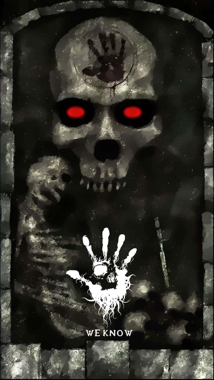 Dark Brotherhood 桌布 壁紙 — 一個帶有發光紅眼和額上手印的威脅性骷髏頭潛伏在石拱門後面。