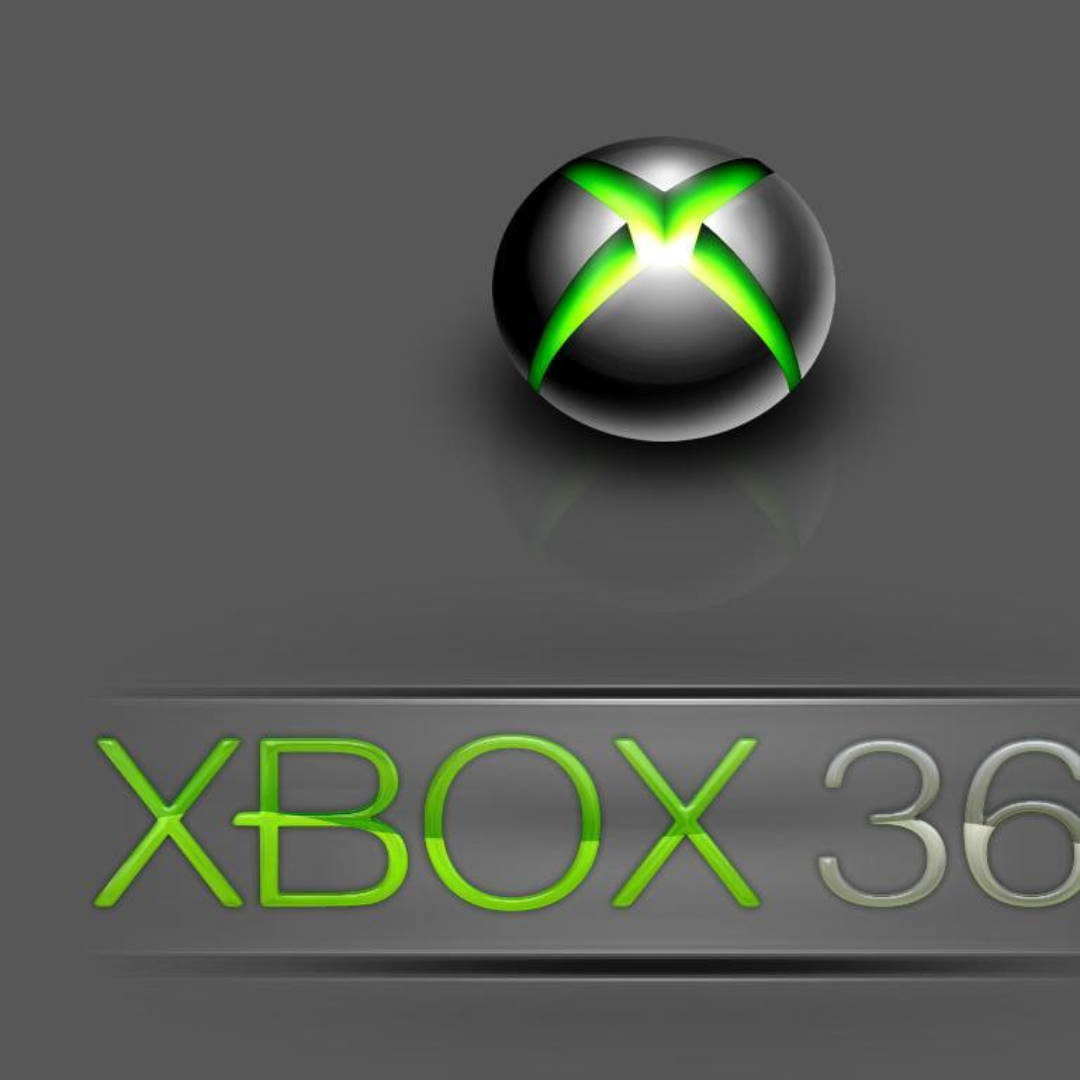 Xbox 桌布 壁紙 — 一個帶有發光綠色X標誌的光澤黑色Xbox 360標誌球體，位於深灰色表面上發光的綠色和銀色Xbox 360文字上方。