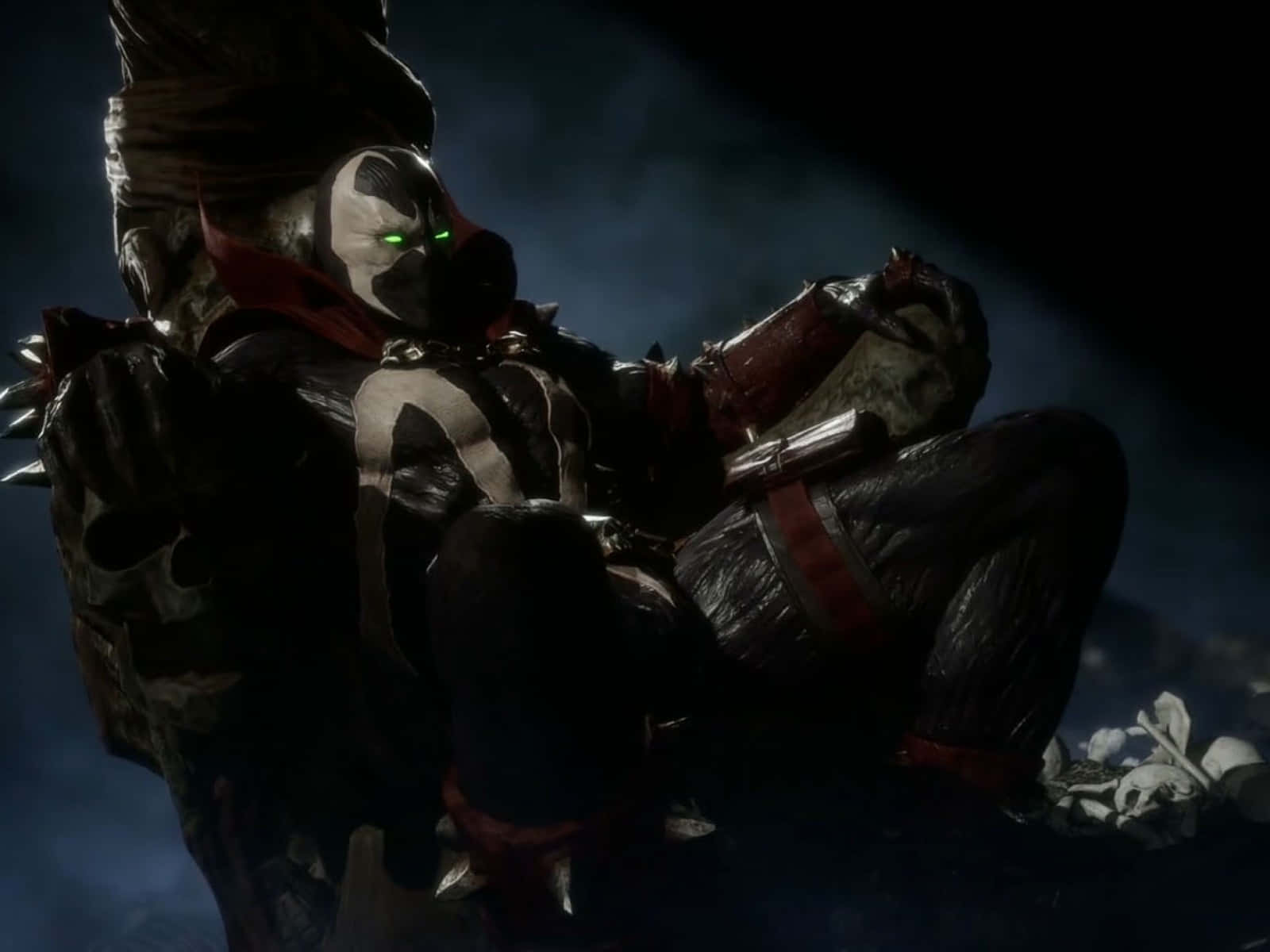 Mortal Kombat 11 Spawn 桌布 壁紙 — 一個帶有發光綠色眼睛的威脅性蒙面戰士坐在黑暗煙霧環境中的頭骨之間。