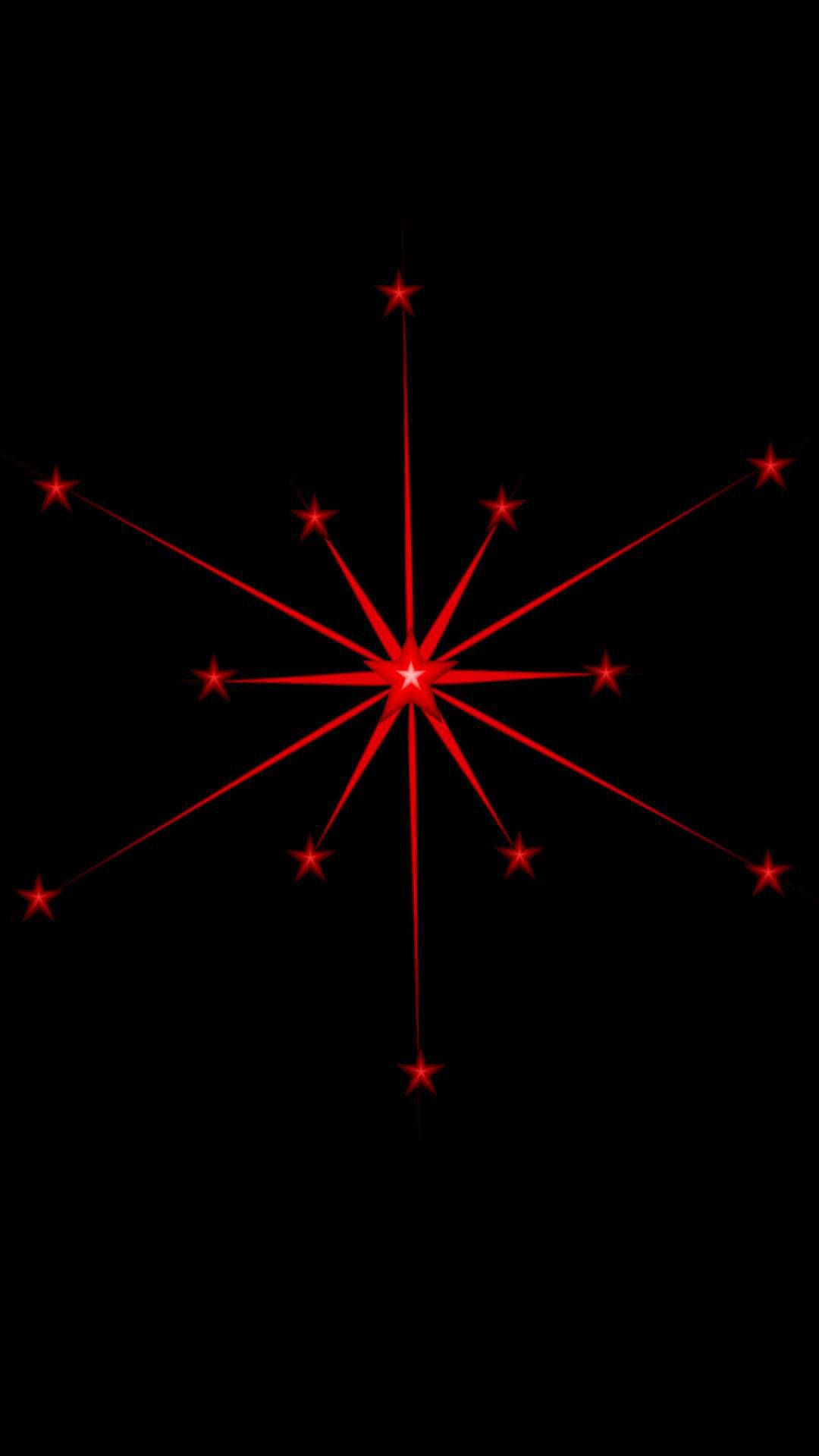 Red Star 桌布 壁紙 — 一個帶有發光點的放射狀紅色星爆，在純黑色背景上散發光芒。