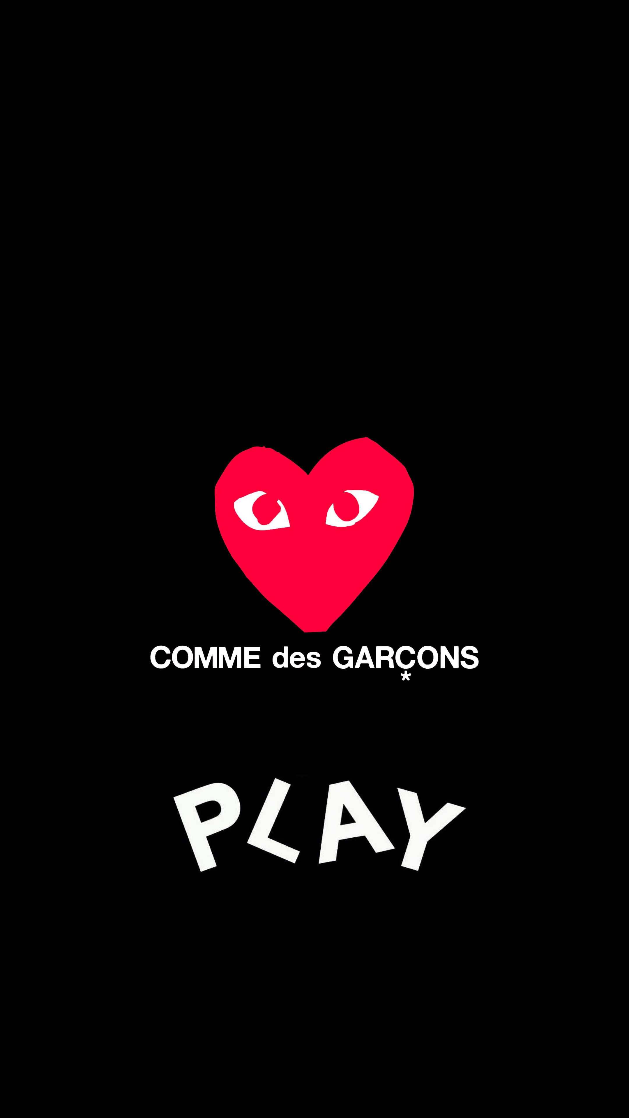 cdg 桌布 壁紙 — 一個帶有眼睛的鮮紅色心形，置中在黑色背景上，白色文字寫著 COMME des GARÇONS 和 PLAY。