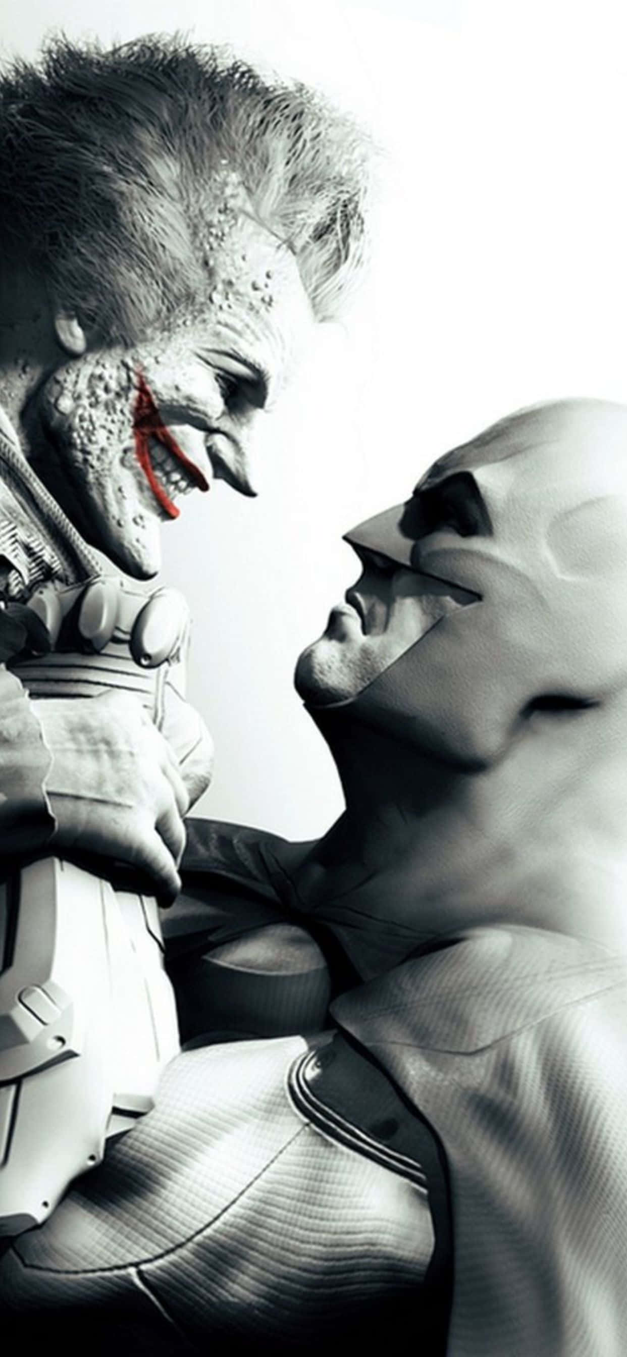 iPhone Xs Max Batman Arkham City 桌布 壁紙 — 一個帶有紅唇的威脅性小丑在黑白鮮明的對峙中抓住蝙蝠俠的脖子。