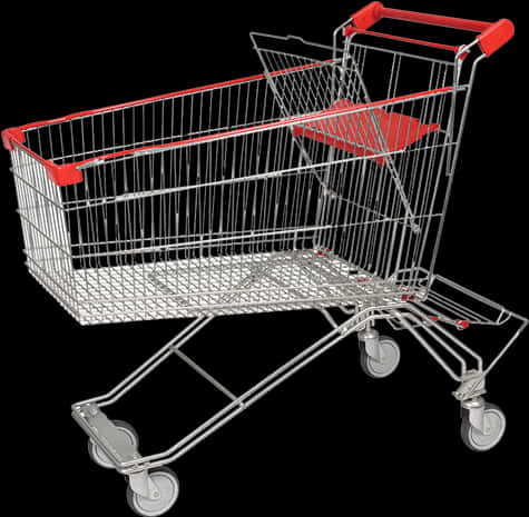 Shopping Cart 桌布 壁紙 — 一個帶有紅色點綴的銀色購物車孤立地立在黑色背景上，輪子準備好移動。