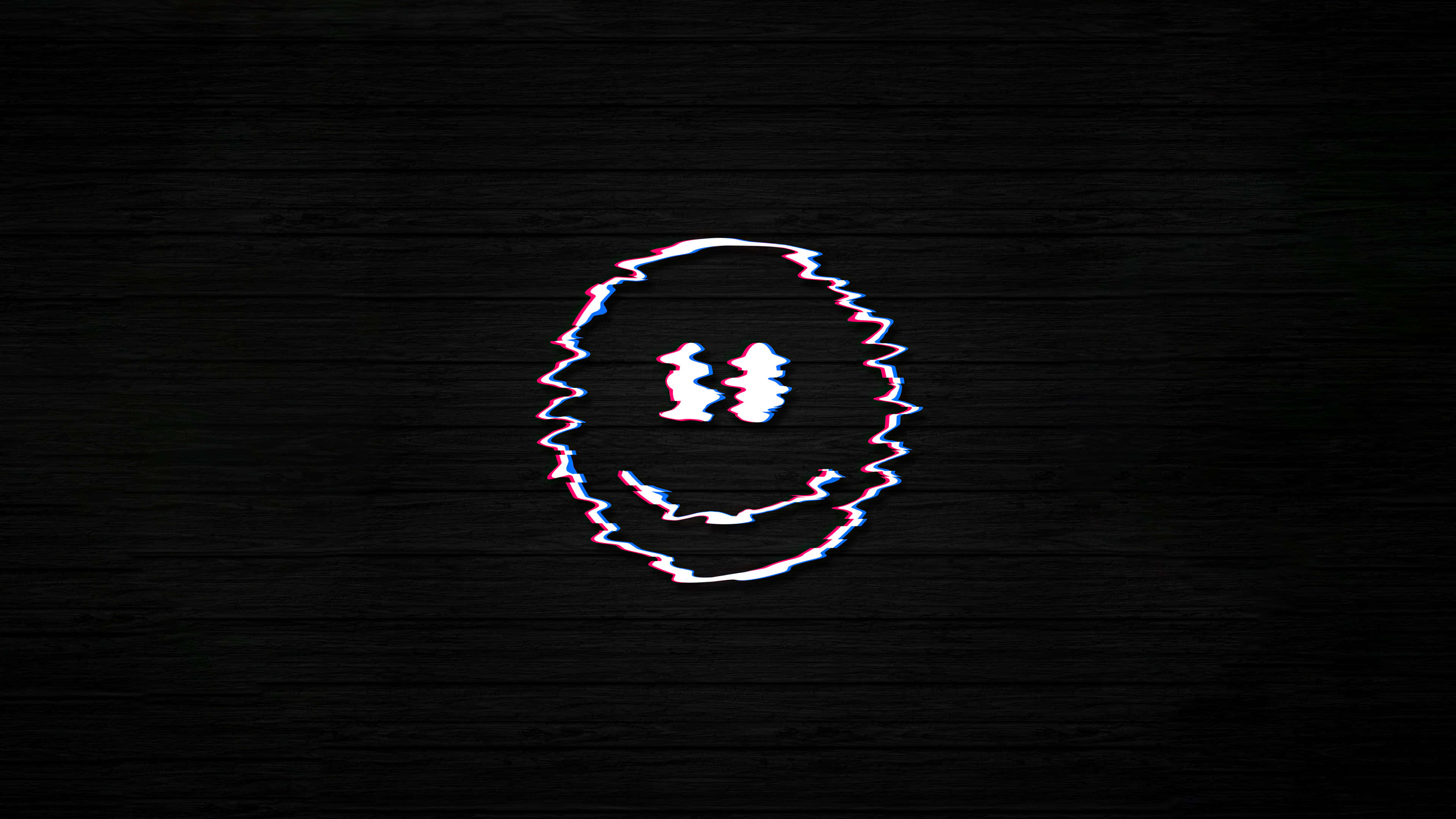 Smile 桌布 壁紙 — 一個帶有紅藍色差脈衝的故障扭曲笑臉，在深色紋理背景上。