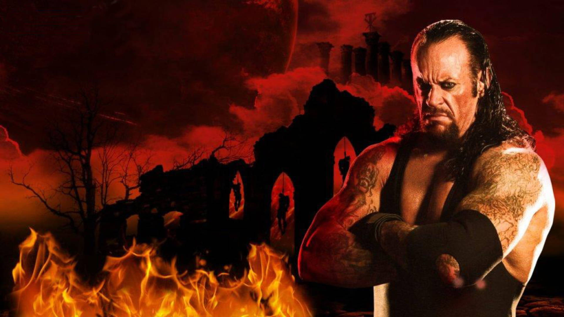 Undertaker 桌布 壁紙 — 一個帶有紋身的威脅性摔角手站在火焰和廢墟哥德式建築前，天空血紅。