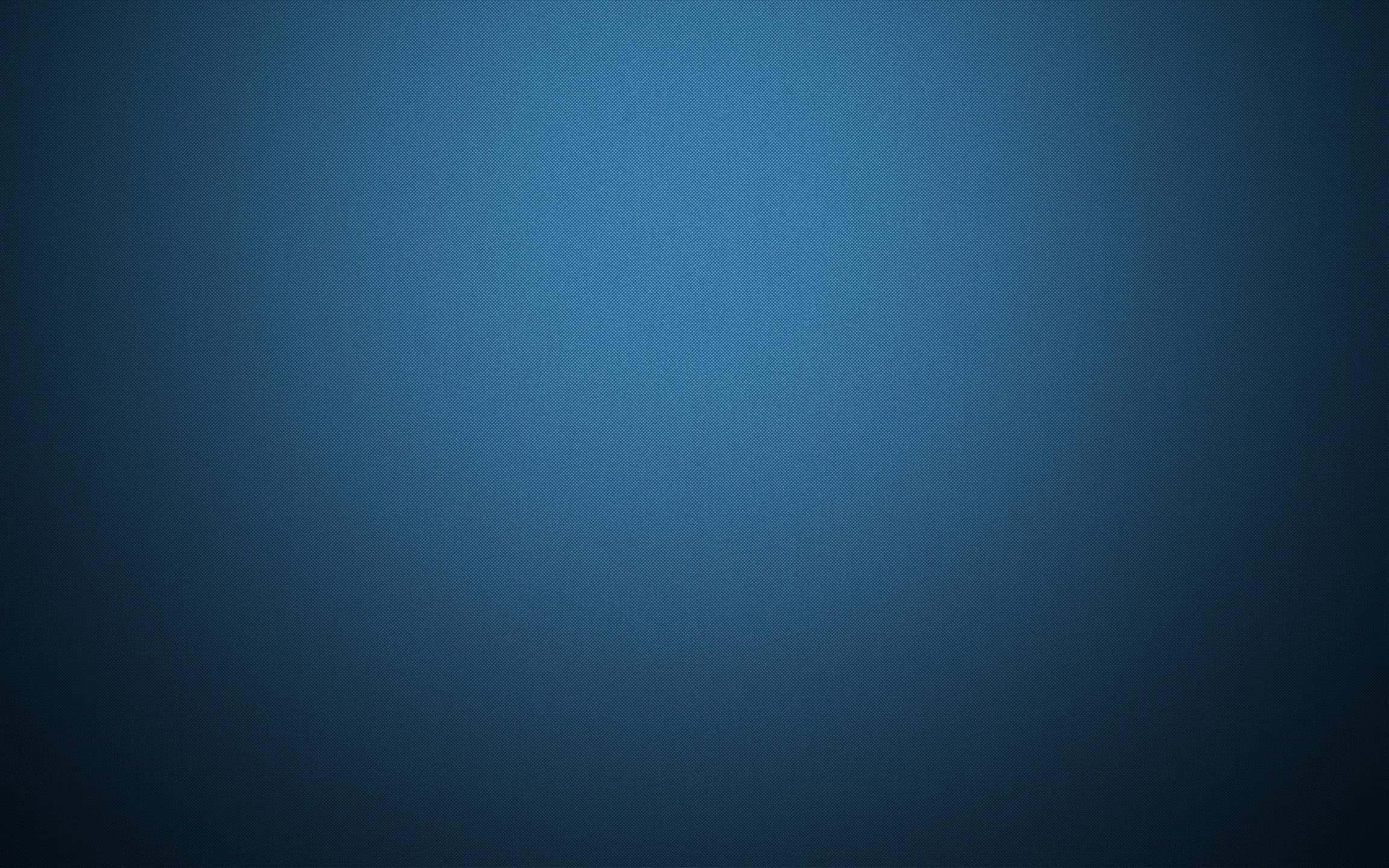 Gradient 桌布 壁紙 — 一個帶有細微紋理的漸變藍色背景，從深藍色漸變到中藍色。