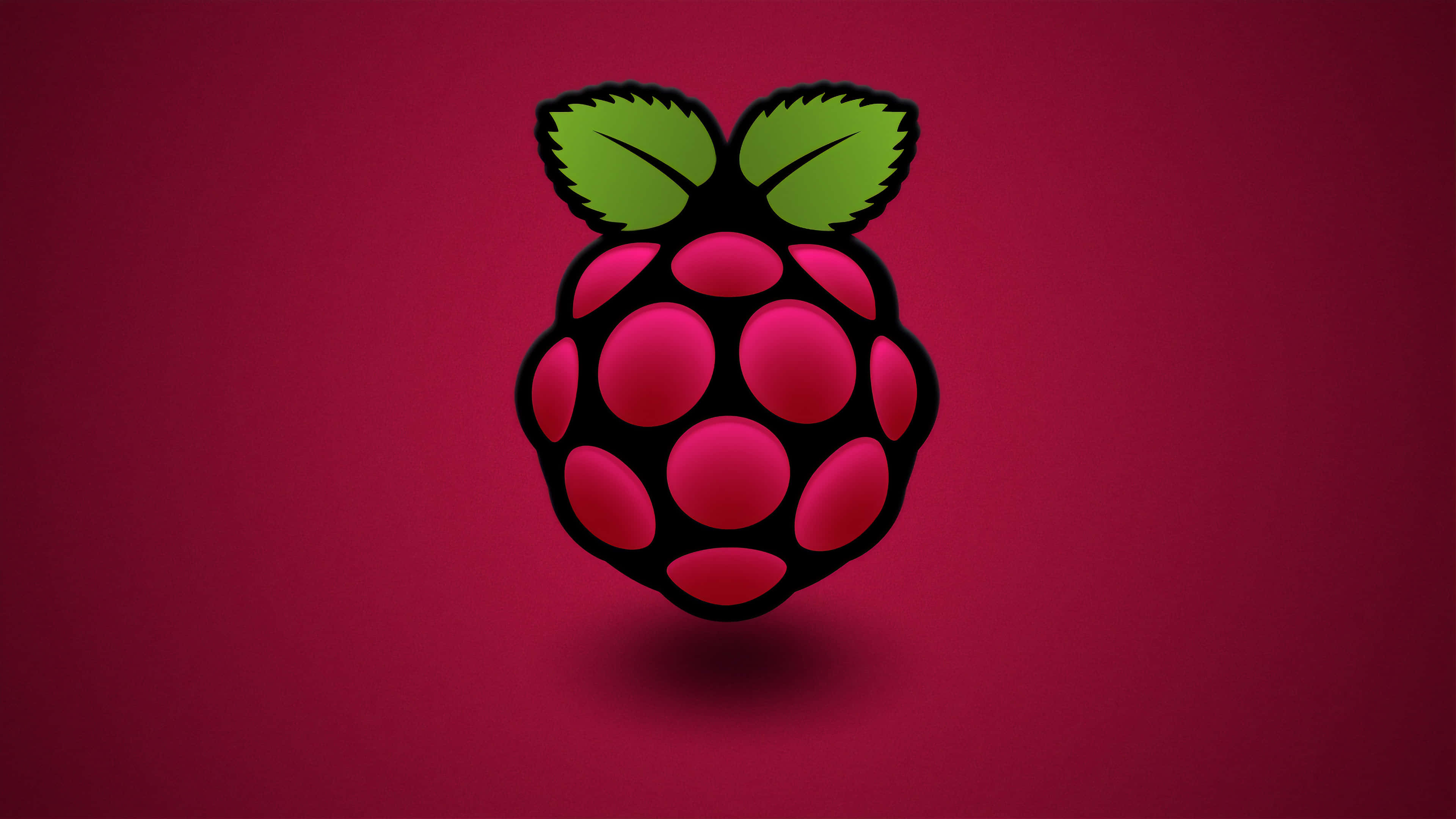 Raspberry 桌布 壁紙 — 一個帶有綠色葉子的風格化覆盆子標誌漂浮在深洋紅色背景上。