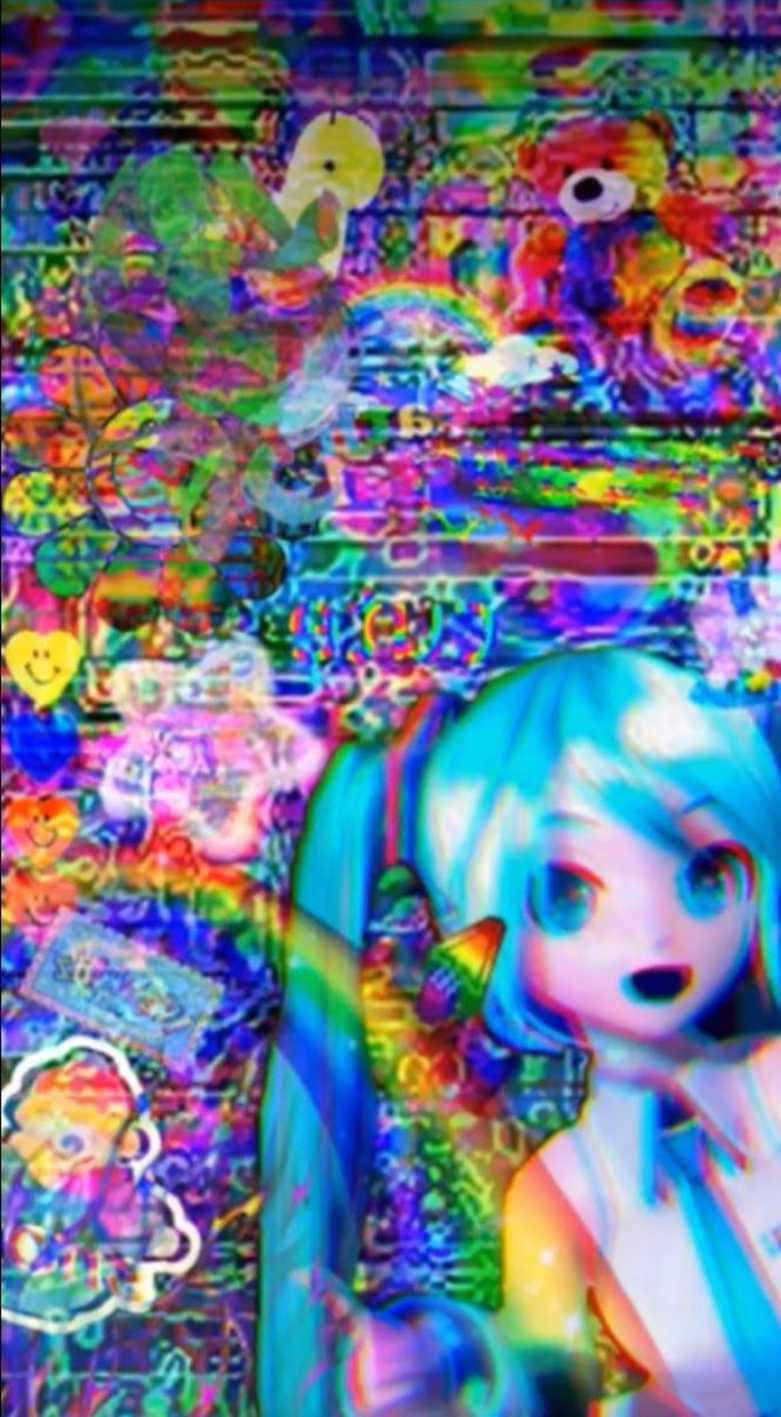 初音未來 桌布 壁紙 — 一個帶有藍色頭髮的故障動漫女孩從一個混亂的彩虹色數位拼貼畫中出現，其中包含玩具和符號。